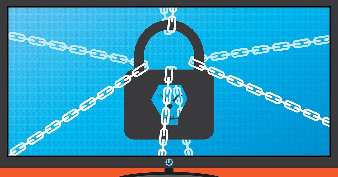 Ransomware concept graphic showing a chained computer monitor